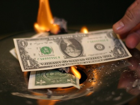 Компания Reuters считает снижение господства доллара в мире причиной введения санкций против России